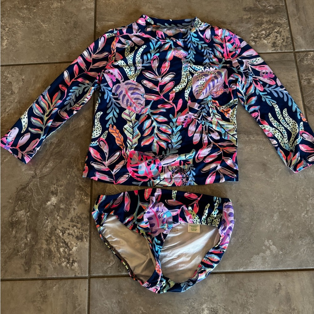 Lily Pulitzer Rash Guard suit SZ 8.  GUC since it’s been in the pool/chlorine.